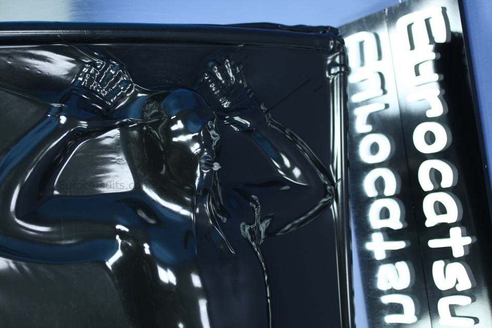 Breathplay in latex - breathing regulator attached to black latex vacbed . The vacuumbed remains totally airtight .