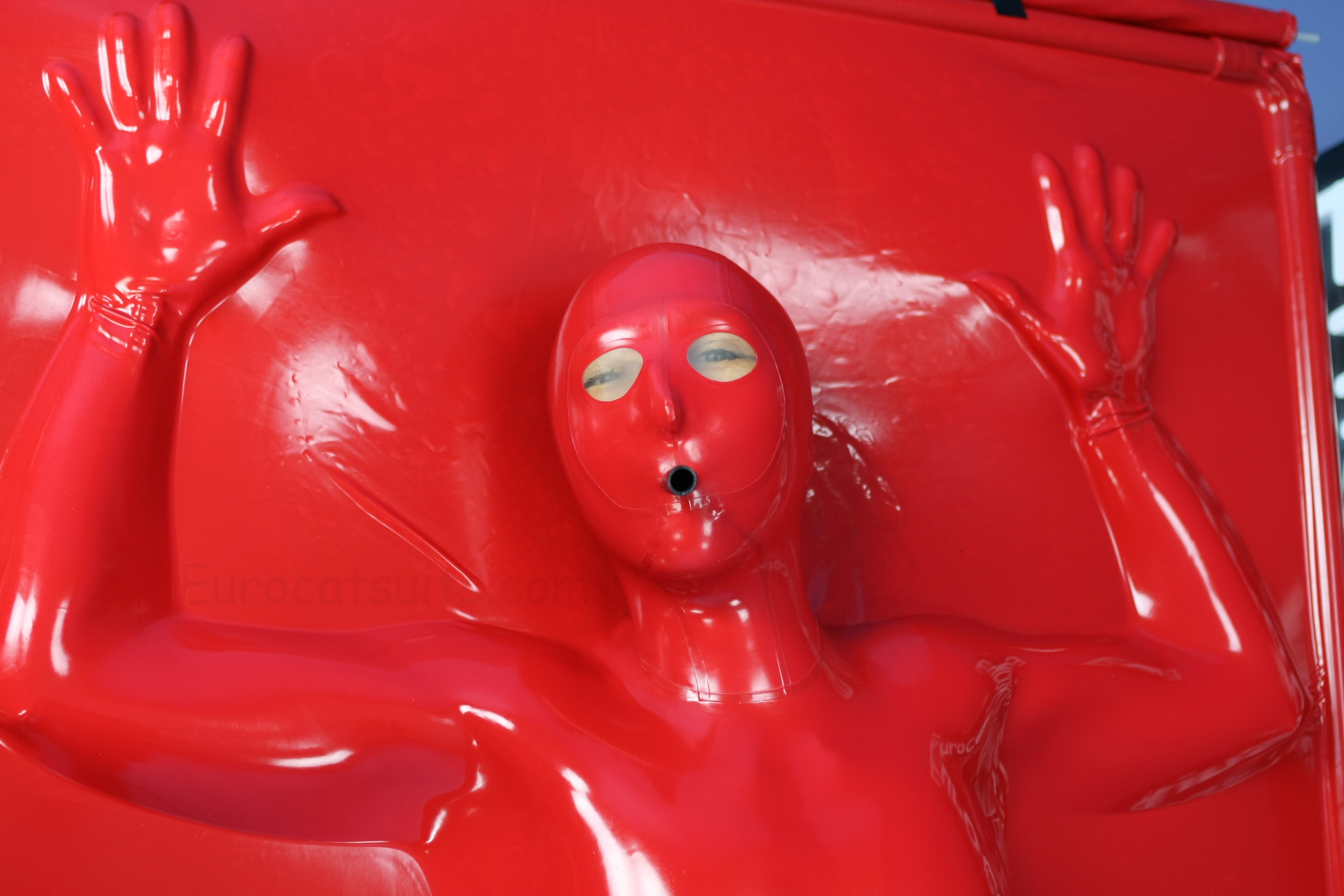 red latex vacbed with attached mask ( transparent latex lens + attached latex hose)